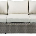 Three Piece Outdoor Gray Wicker Sectional Seating Group with Beige Cushions