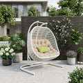 69" Beige and White Metal Indoor Outdoor Swing Chair with Beige Cushion
