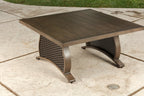 Two Piece Brown and Tan Metal Sectional Seating Group With Table