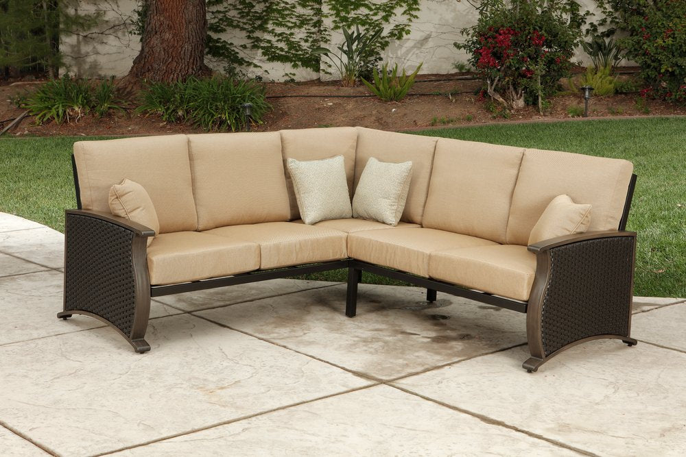 Two Piece Brown and Tan Metal Sectional Seating Group With Table