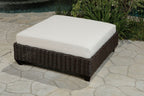 Four Piece Brown and White Wicker Sectional Seating Group