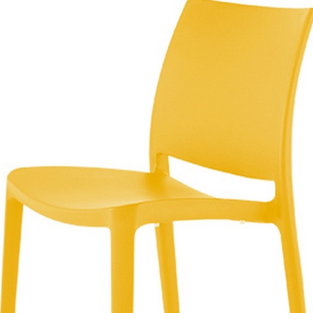 Set of Four Gold Heavy Duty Plastic Outdoor Stacking Dining Chairs