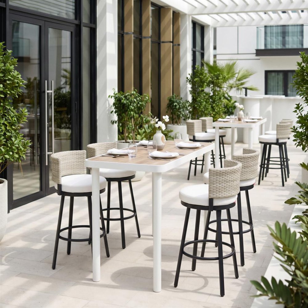 31" Black Natural and White Aluminum And Faux Rattan Swivel Bar Height Bar Chair