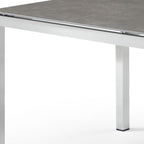 63" Dark Gray and Silver Ceramic Glass and Stainless Steel Outdoor Dining Table