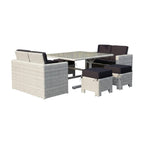 Seven Piece White and Dark Gray Wicker Upholstered Cushions Outdoor Patio Set With Table